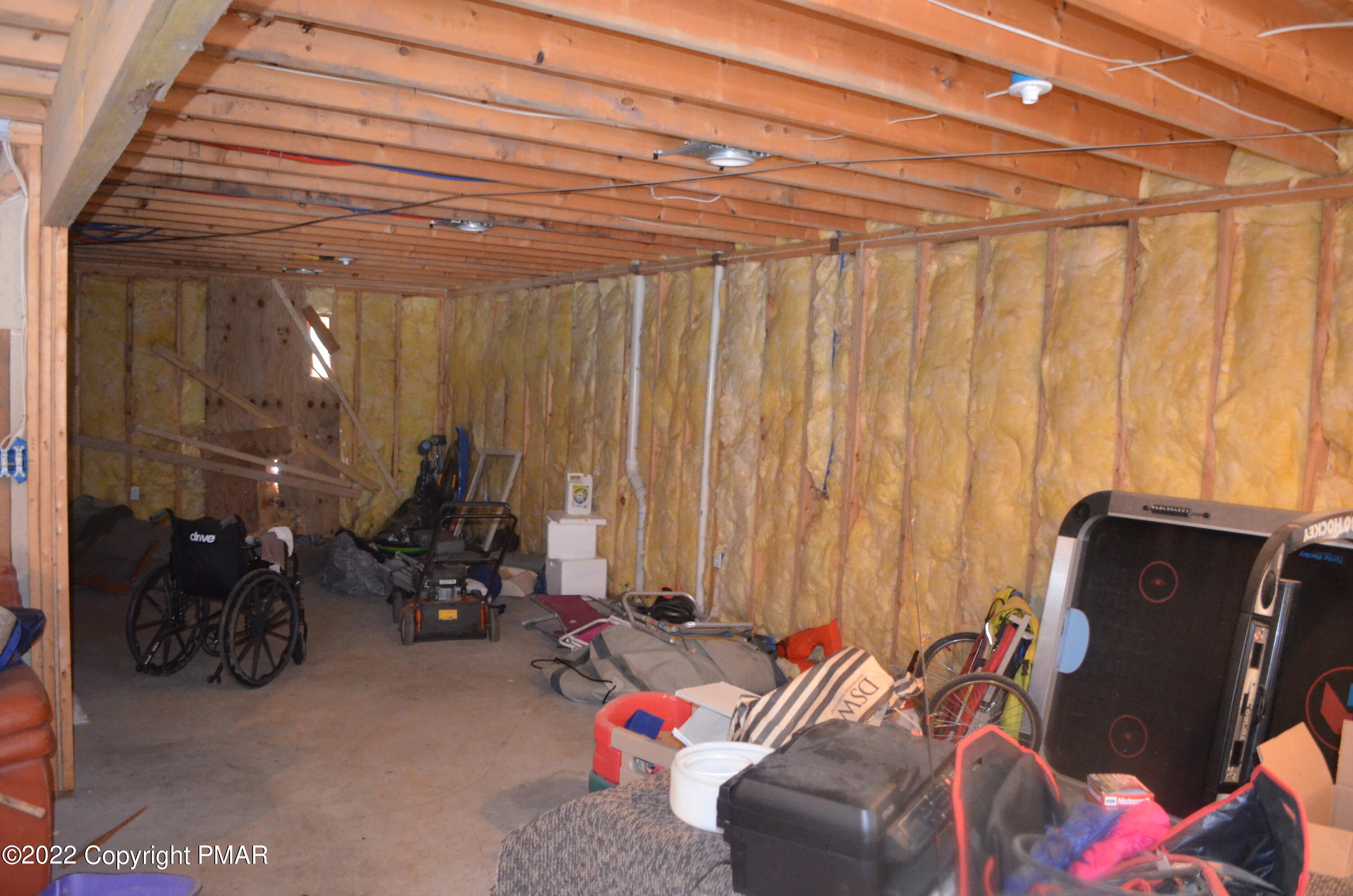 145 Pontiac Path Pocono Lake, PA 18347 - Photo 12 of 13 a room with furniture and musical instruments