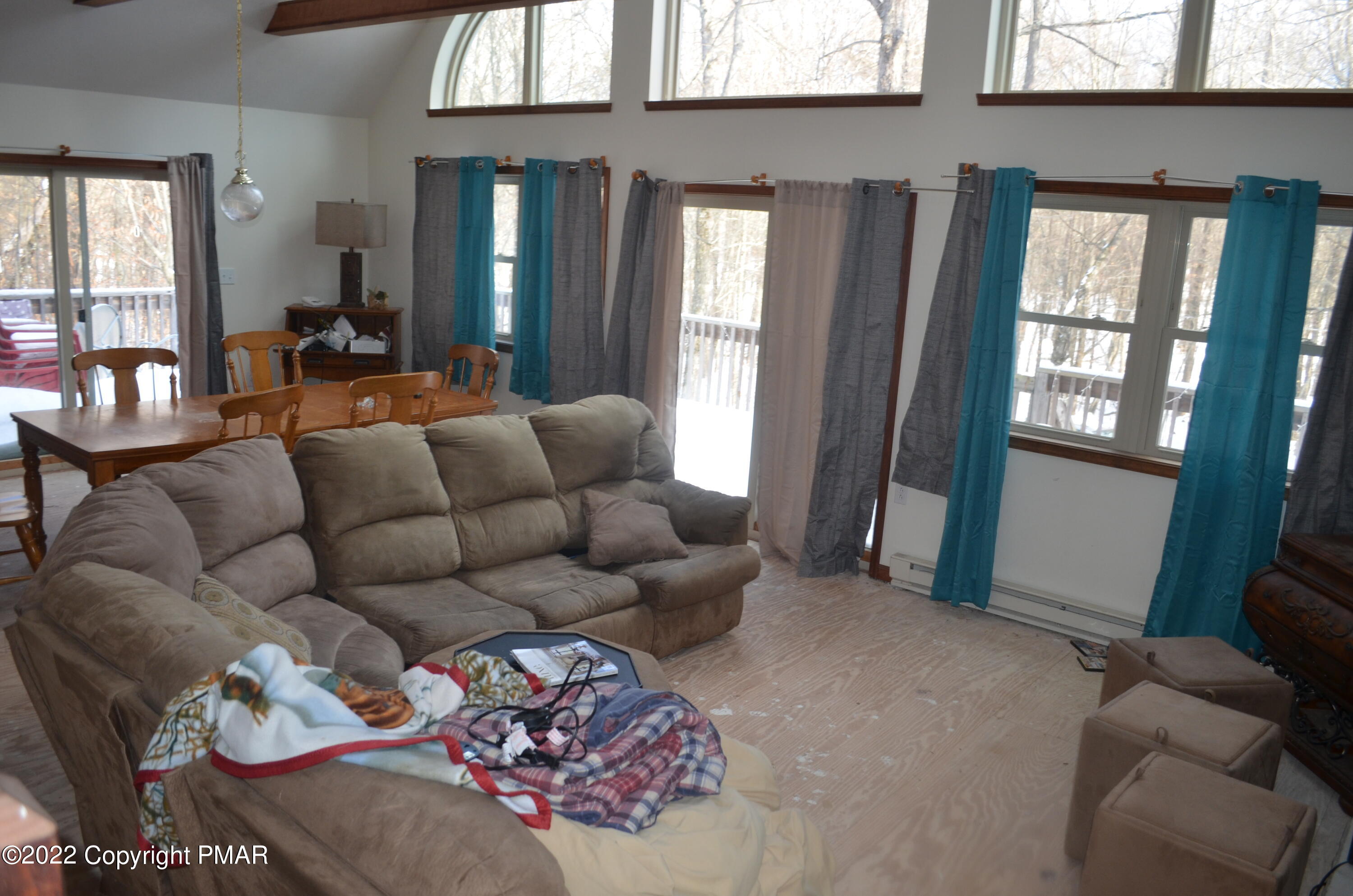145 Pontiac Path Pocono Lake, PA 18347 - Photo 3 of 13 a living room with furniture and a window