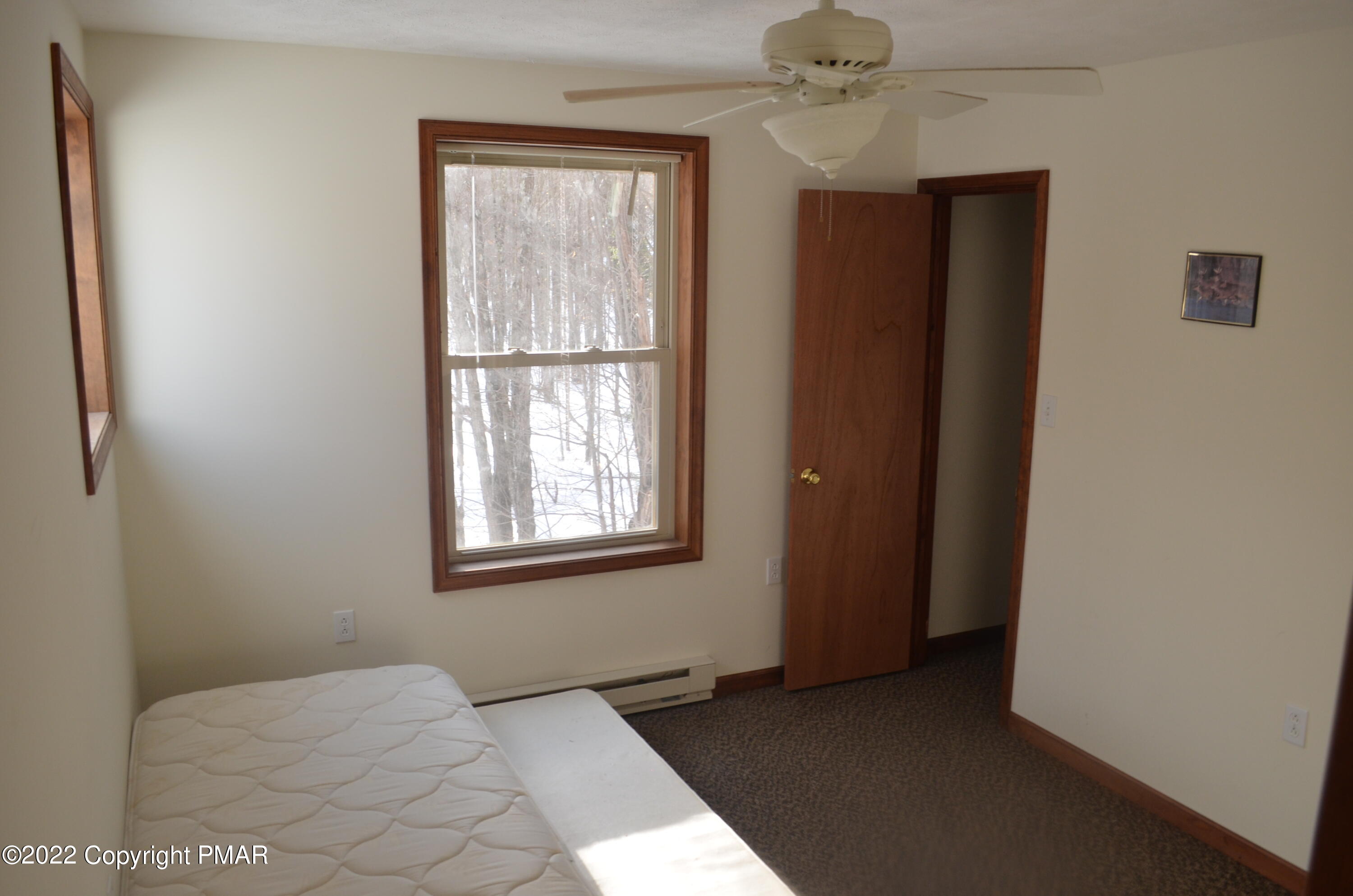 145 Pontiac Path Pocono Lake, PA 18347 - Photo 6 of 13 a view of an empty room with a window