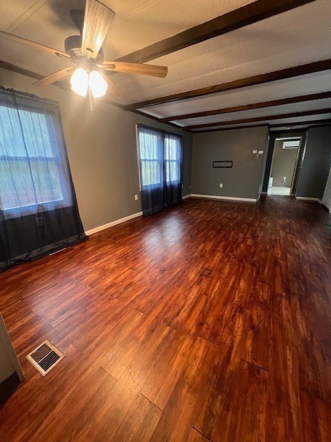 217 Cheshire Park Wareham, MA 02571 - Photo 5 of 13 a view of a livingroom with wooden floor and a ceiling fan