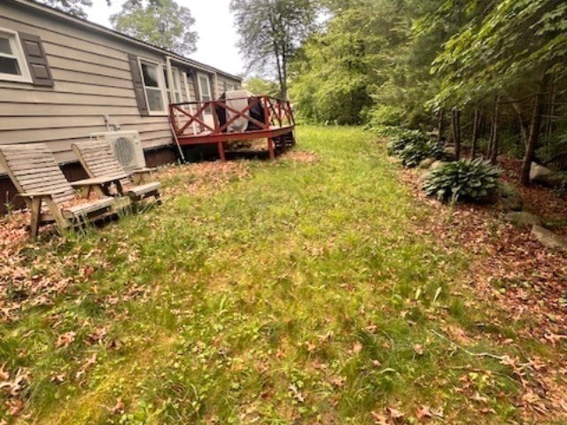 217 Cheshire Park Wareham, MA 02571 - Photo 10 of 13 a view of a house with backyard and sitting area