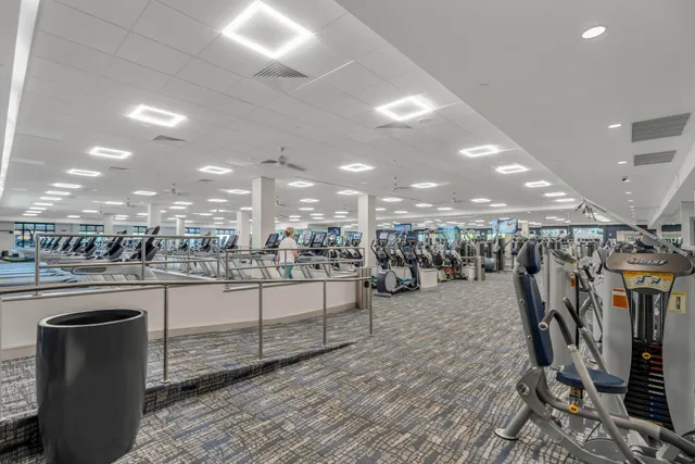 a view of a lake with houses in the back