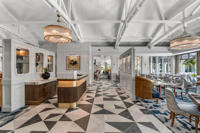a view of a chairs and tables in the patio