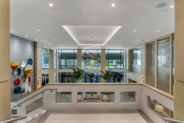 a view of a patio with a table and chairs