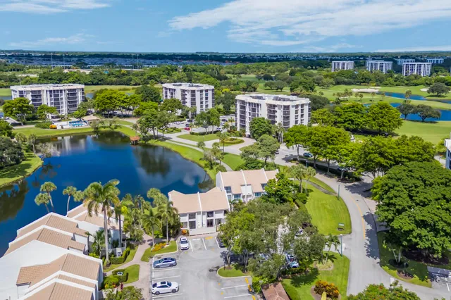 an aerial view of residential house with outdoor space and swimming pool