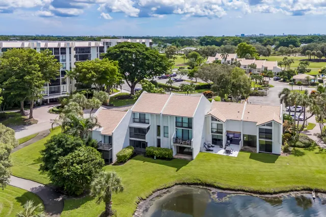 a picture of a table with chairs and a flower pot