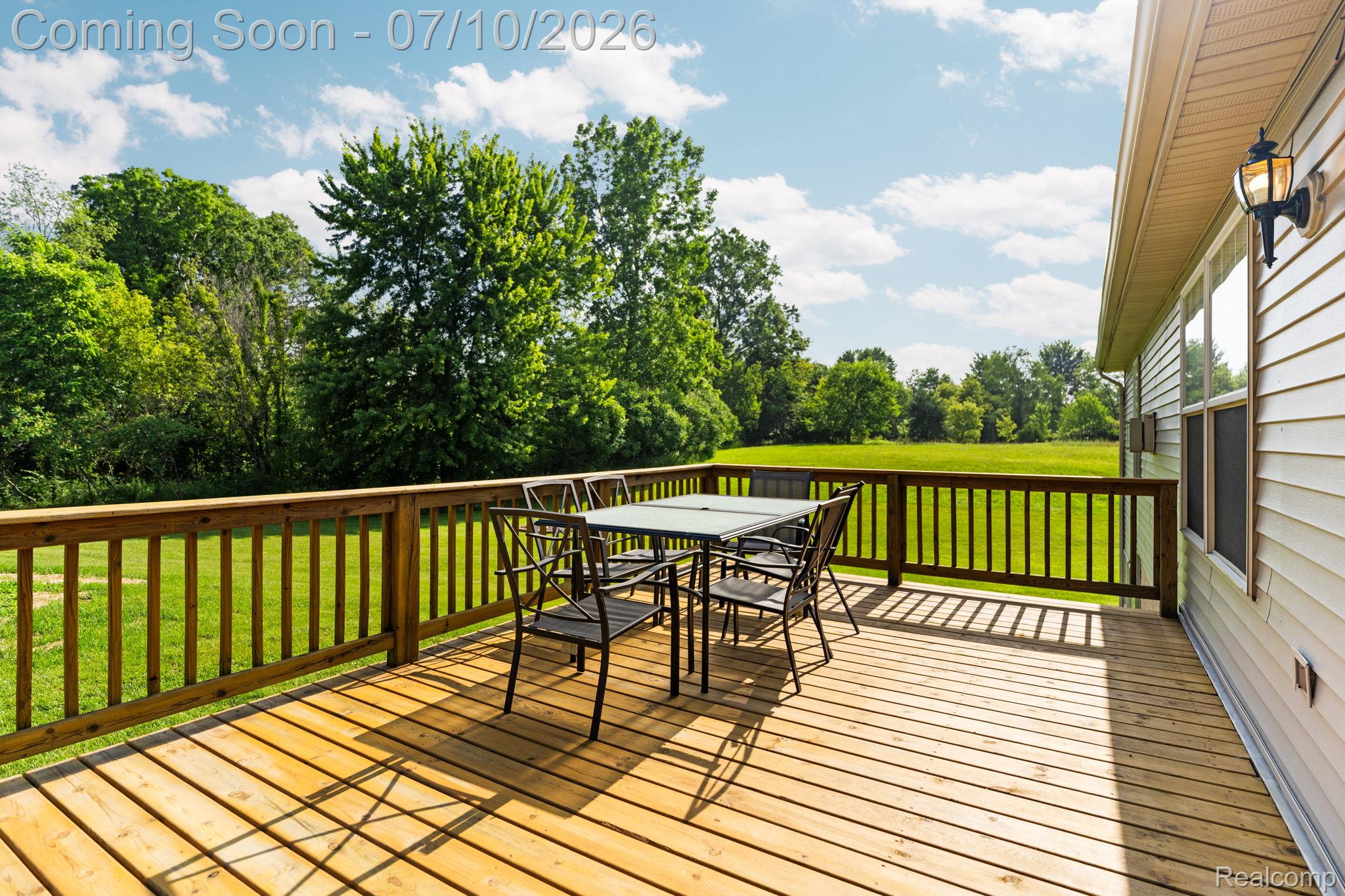 3144 North Nicholson Road Fowlerville, MI 48836 - Photo 26 of 70 Expansive wood deck with a full railing system