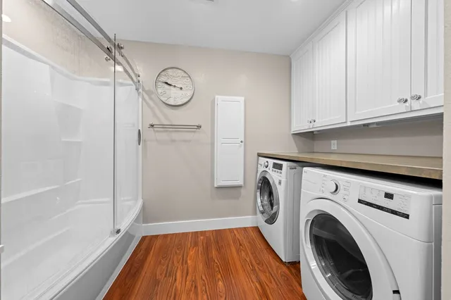 a view of storage and utility room with washer and dryer