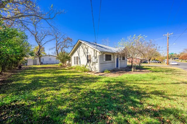 a view of a house with a big yard