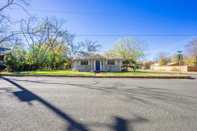 a view of a swimming pool with an outdoor seating