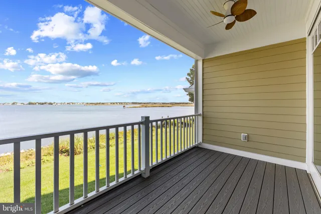 a view of a balcony with wooden floor