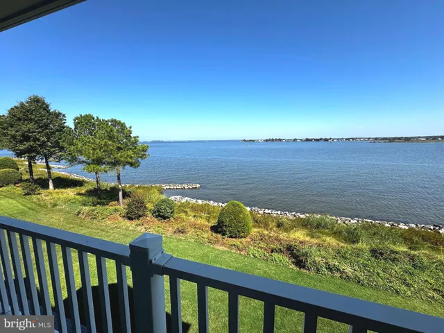 a view of a lake from a balcony
