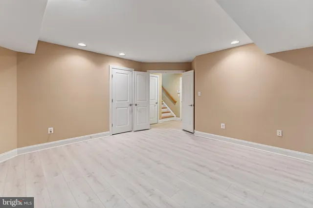 a view of a balcony with wooden floor