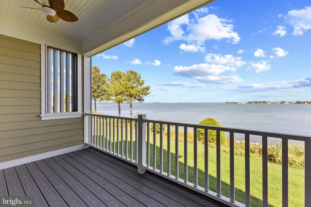 a view of a lake with a yard