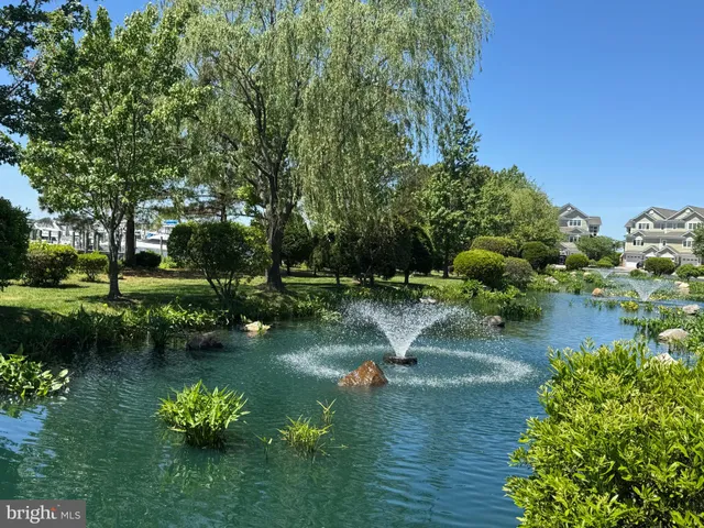 an aerial view of a house with outdoor space