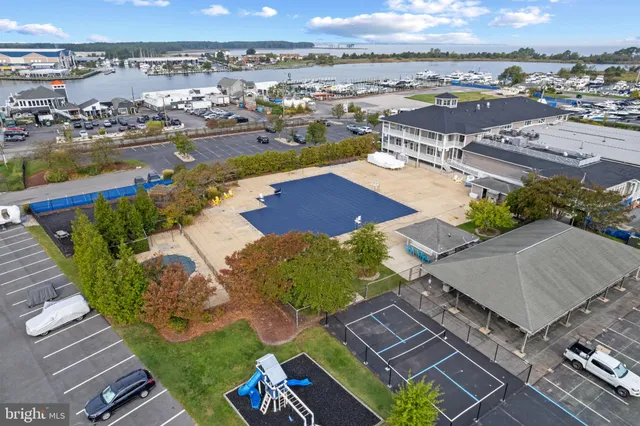 an aerial view of a house with a garden and outdoor space