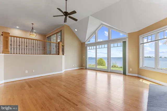 a view of an entryway with wooden floor