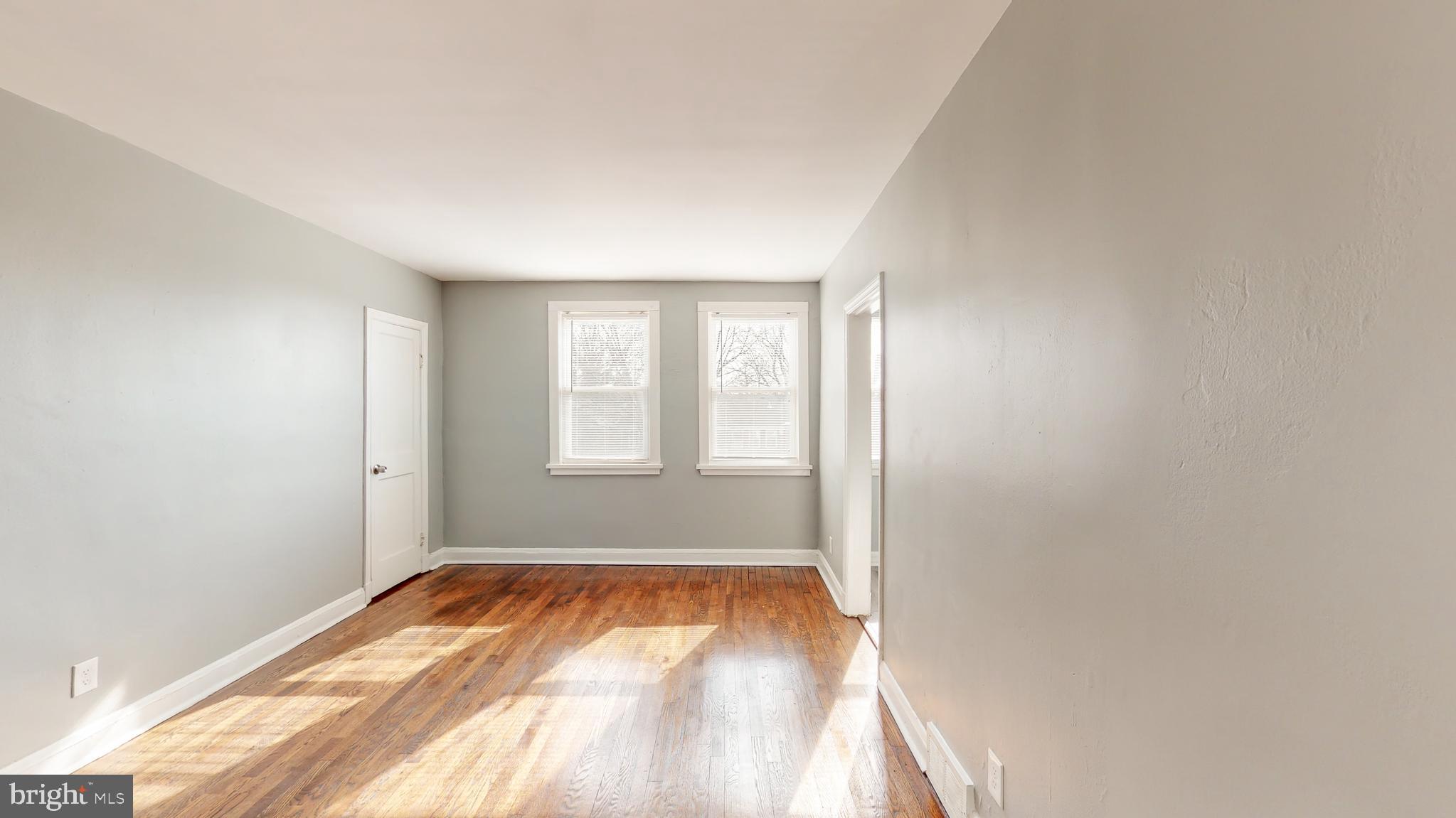 1102 Gleneagle Road Baltimore, MD 21239 - Photo 6 of 19 an empty room with a window