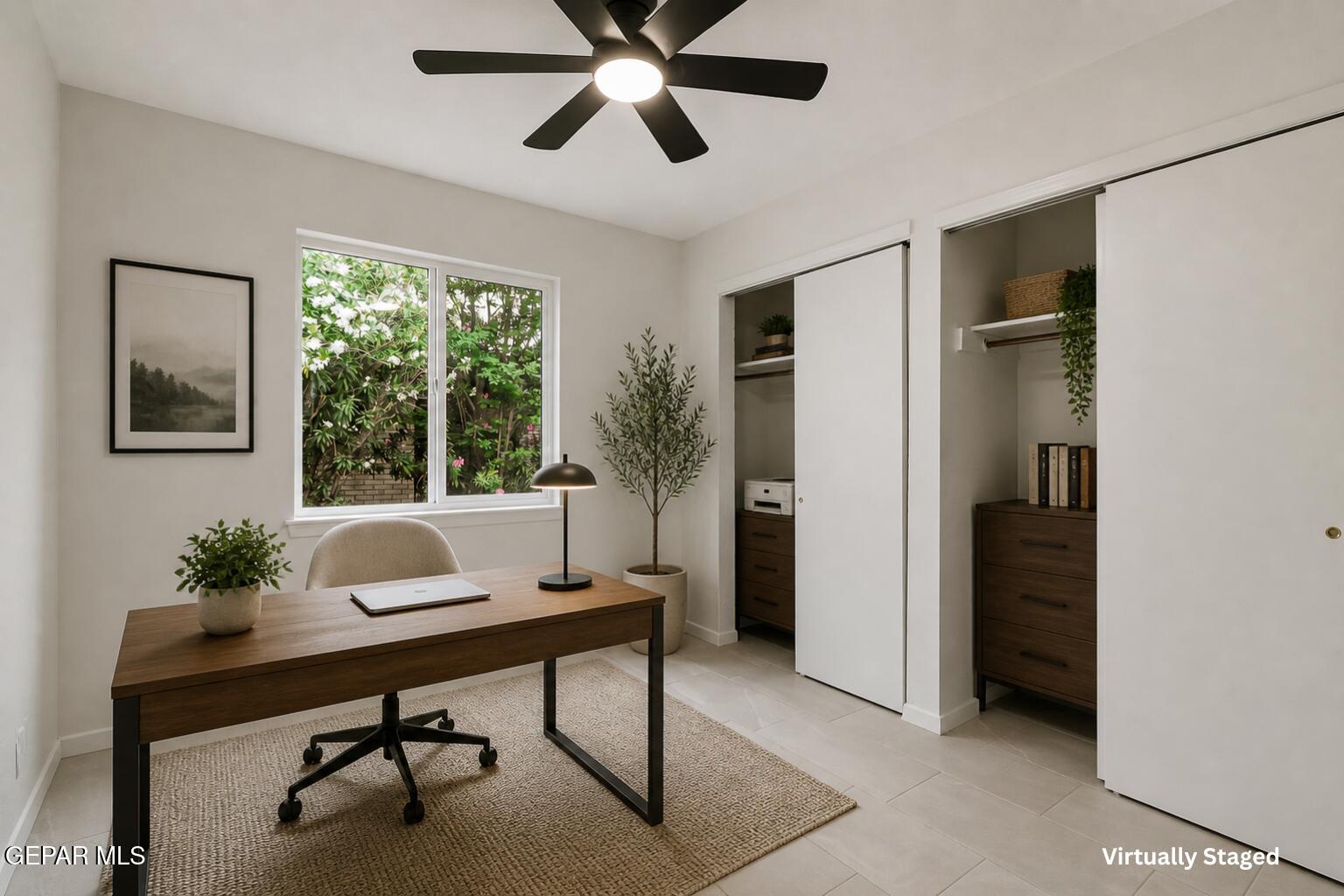 709 Frontera Road El Paso, TX 79922 - Photo 27 of 41 a workspace with furniture and a window