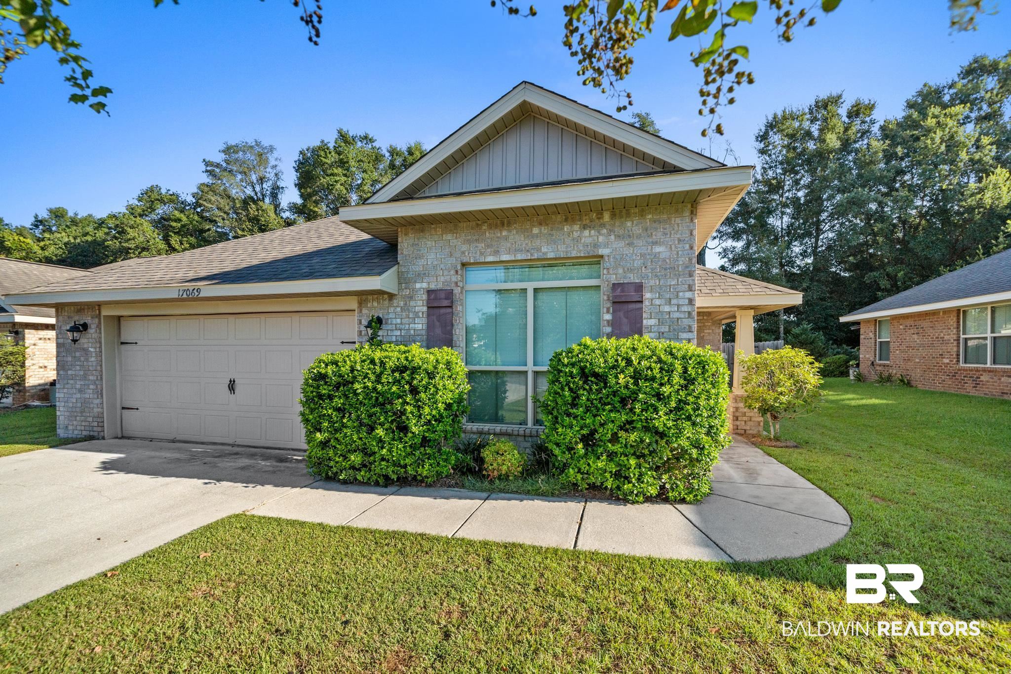 17069 Russet Court Foley, AL 36535 - Photo 1 of 27 View of front facade with a garage and a front yard