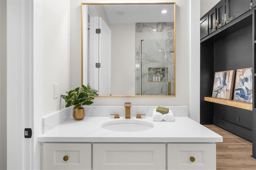 4543 Fawn Path Gainesville, GA 30506 - Photo 18 of 96 a bathroom with a sink and a mirror