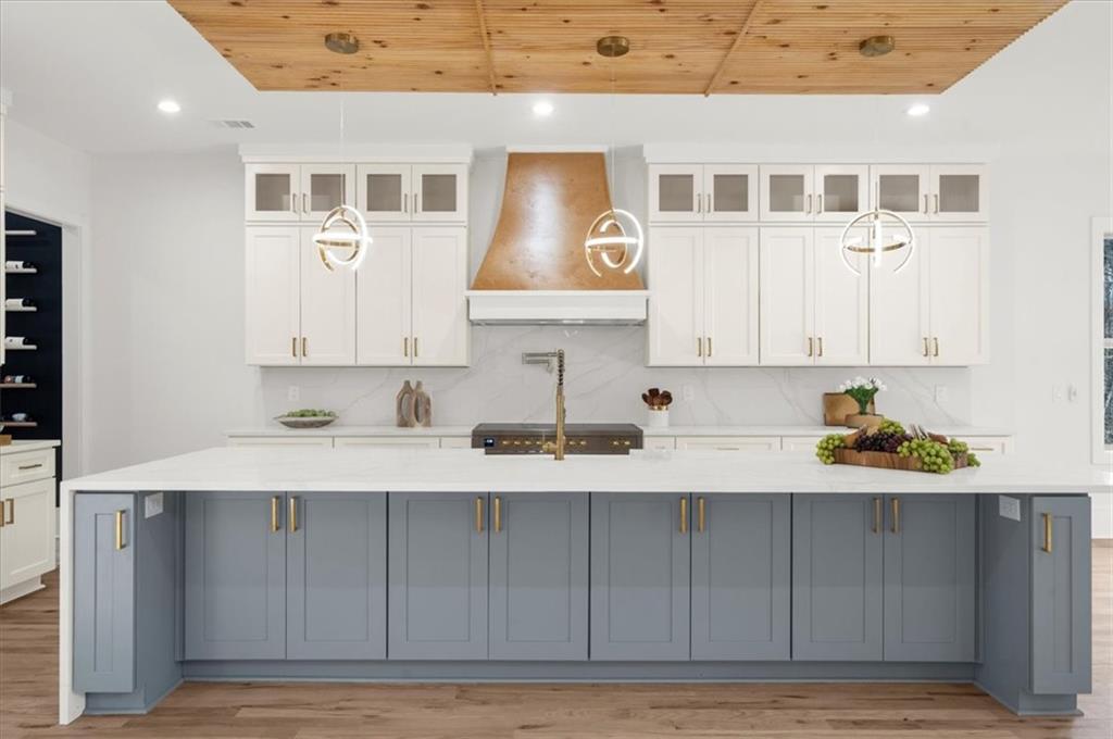 4543 Fawn Path Gainesville, GA 30506 - Photo 23 of 96 a kitchen with a sink and cabinets