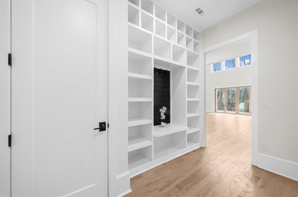 4543 Fawn Path Gainesville, GA 30506 - Photo 43 of 96 a view of an empty room with wooden floor and a window