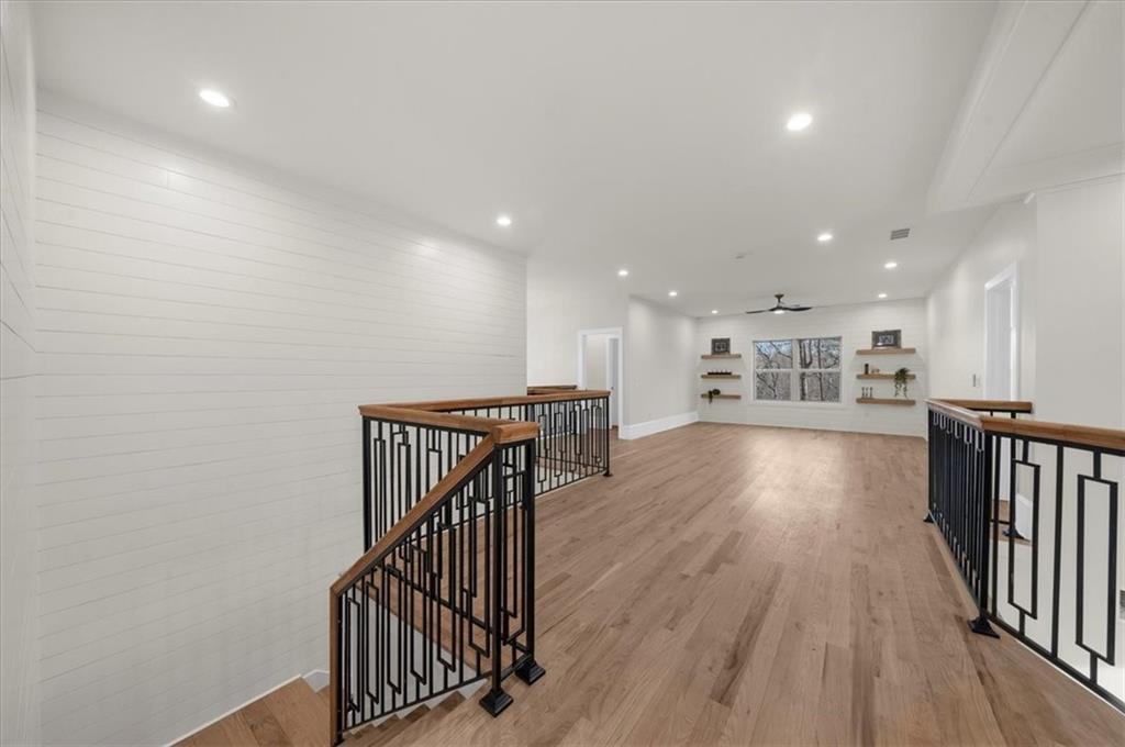 4543 Fawn Path Gainesville, GA 30506 - Photo 60 of 96 a view of kitchen with wooden floor and electronic appliances