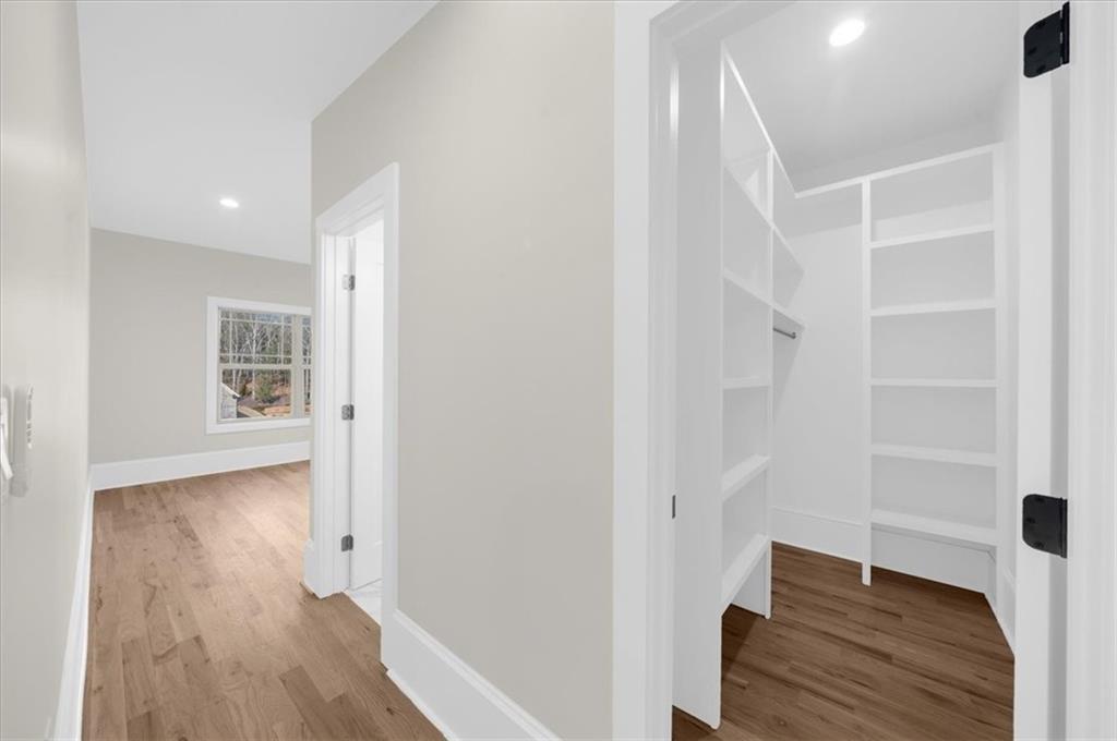 4543 Fawn Path Gainesville, GA 30506 - Photo 69 of 96 a view of hallway with wooden floor