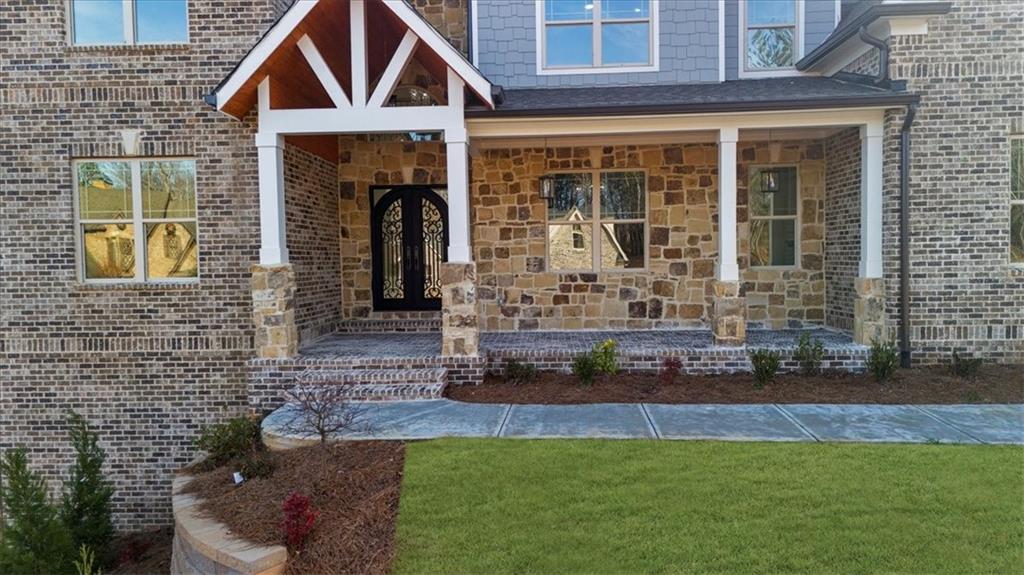 4543 Fawn Path Gainesville, GA 30506 - Photo 7 of 96 a front view of a house with a yard