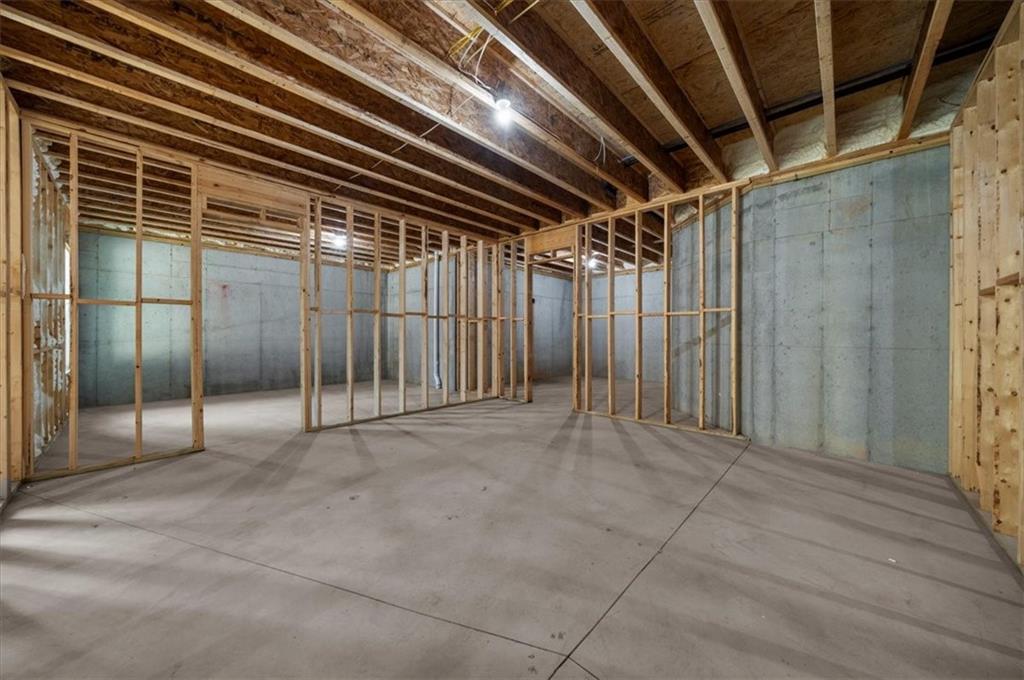 4543 Fawn Path Gainesville, GA 30506 - Photo 86 of 96 a view of an empty room with wooden floor