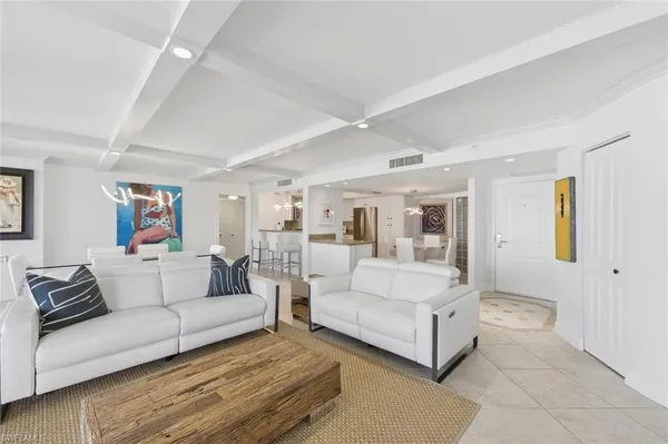 a living room with furniture and a couch