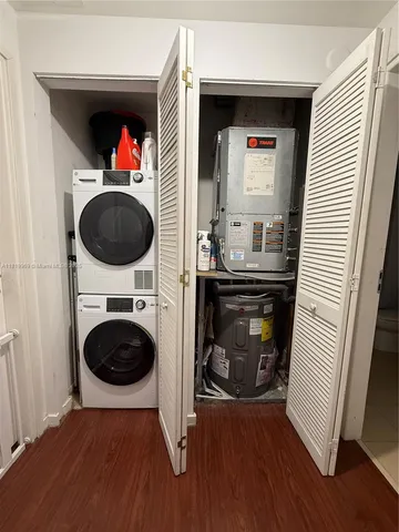 a view of hallway with washer and dryer