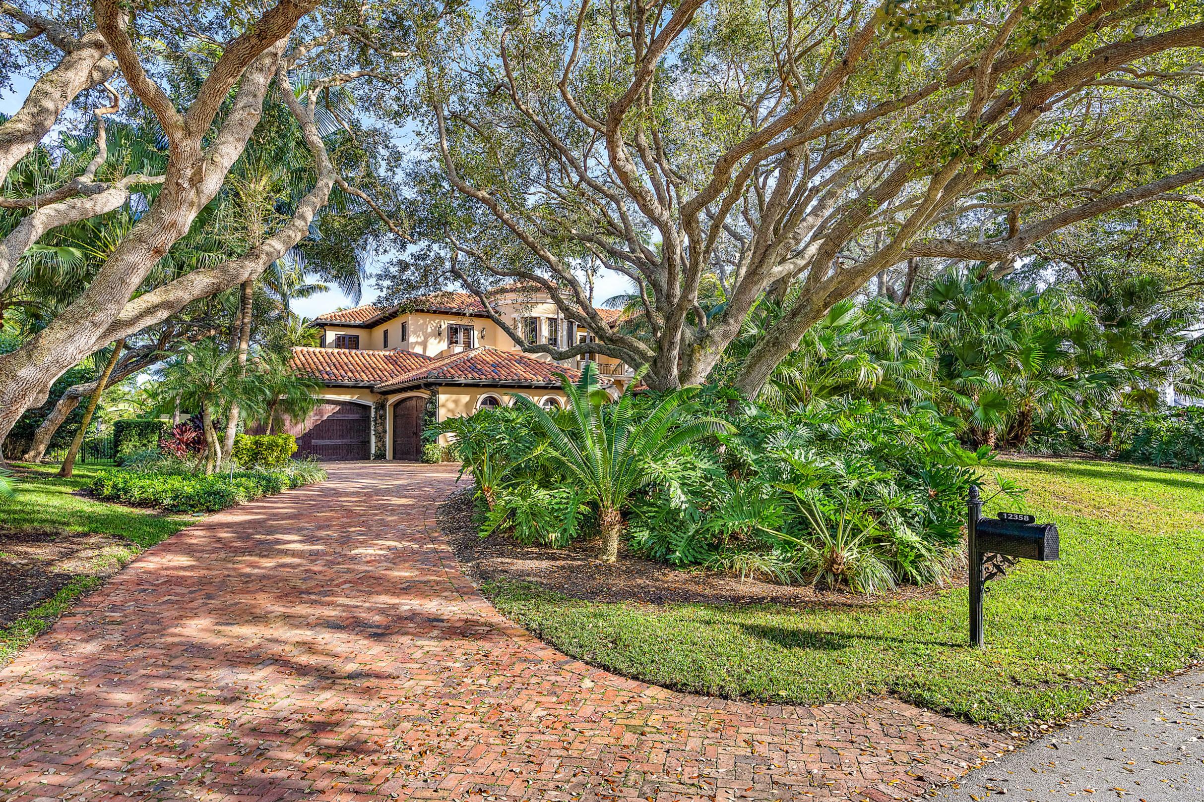12358 Ridge Road North Palm Beach, FL 33408 - Photo 21 of 23 Driveway Entry