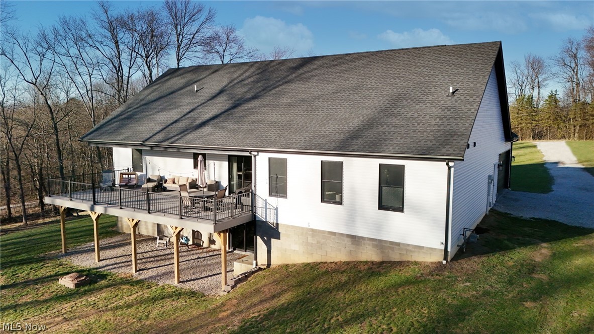258 Friendly Acres Road Wellsburg, WV 26070 - Photo 27 of 47 Back of home featuring a yard, and a deck