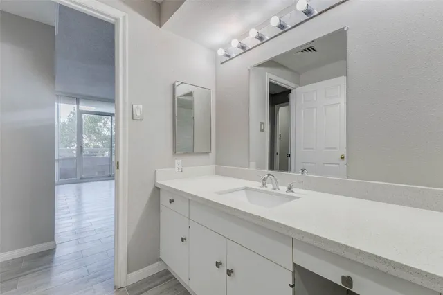 a view of a room with wooden walls