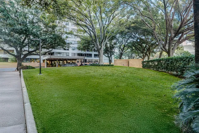 a view of swimming pool with chairs