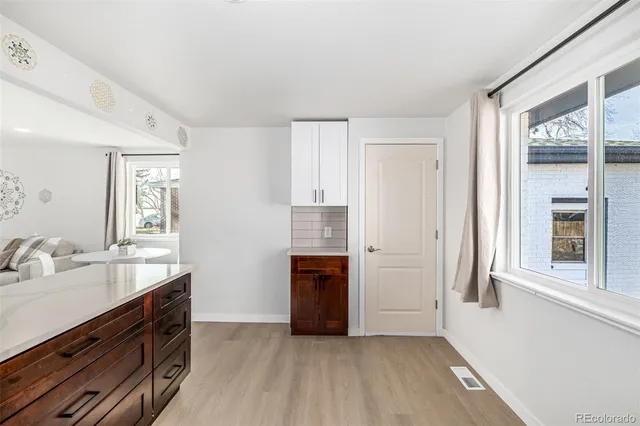 a room with furniture and a window