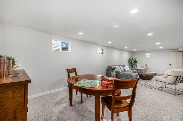 a living room with a couch and a table