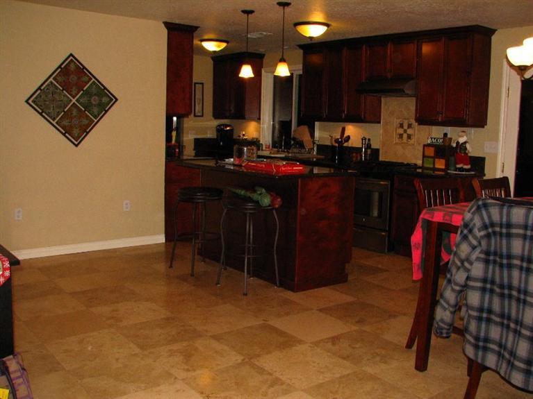 10083 Table Rock Road White City, OR 97503 - Photo 8 of 22 a kitchen with refrigerator and cabinets