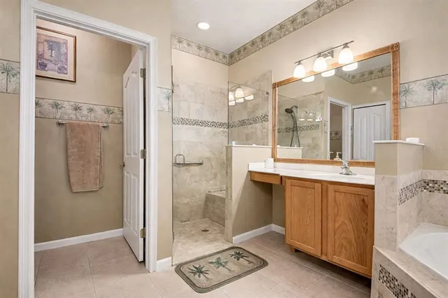 a dining room with furniture and a chandelier