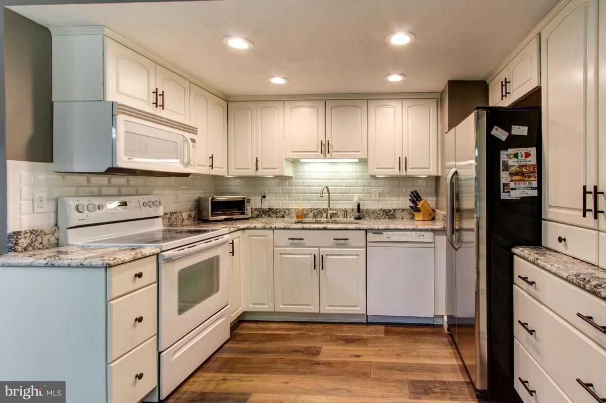 12328 Coleraine Court Reston, VA 20191 - Photo 13 of 30 Recessed lights give good lighting for working