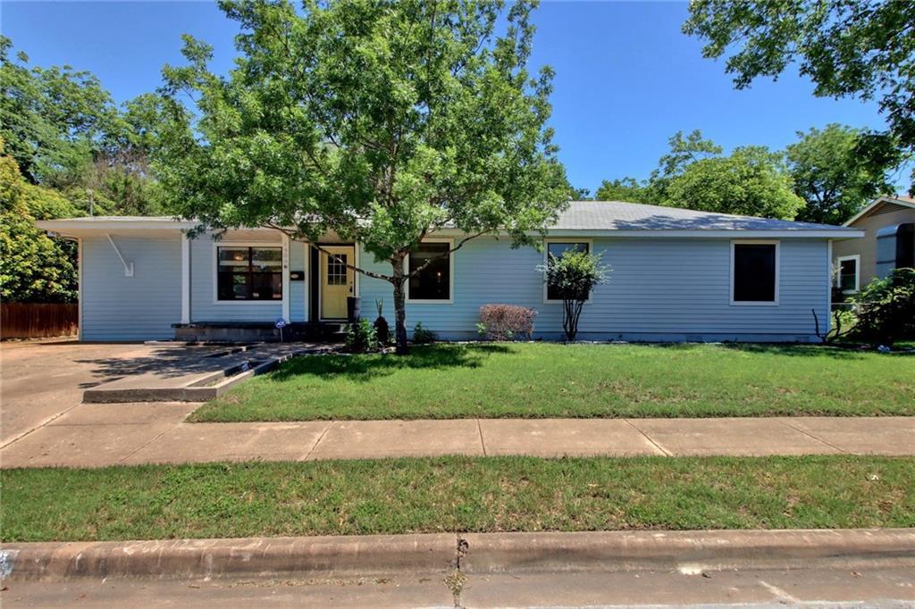 1408 Ruth Avenue Austin, TX 78757 - Photo 1 of 33 a front view of house with yard and green space
