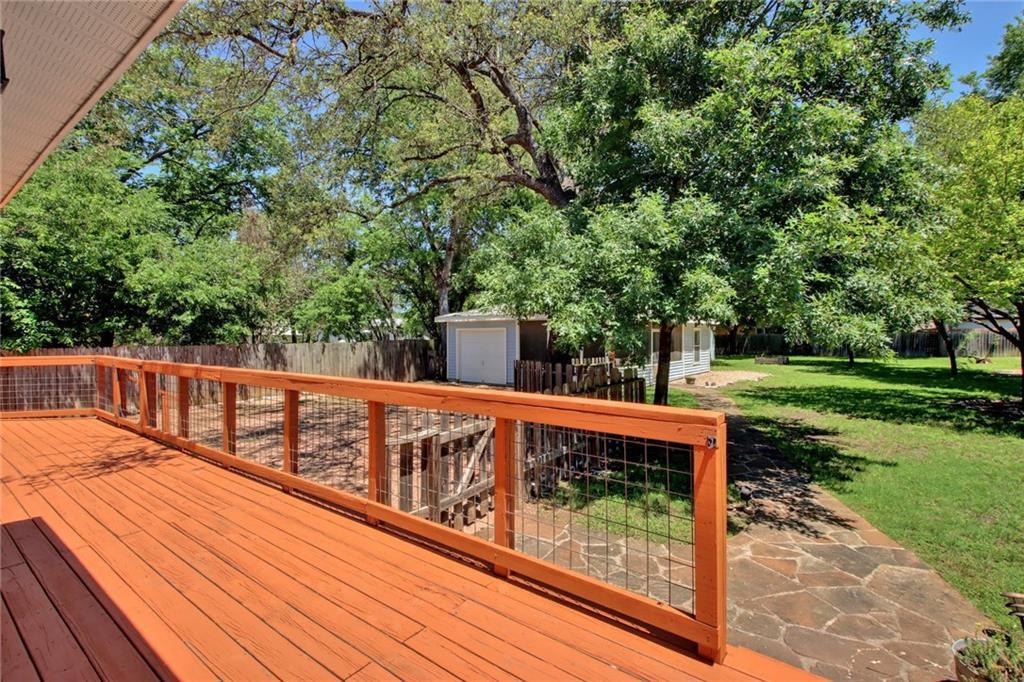 1408 Ruth Avenue Austin, TX 78757 - Photo 22 of 33 a view of balcony with wooden floor and fence