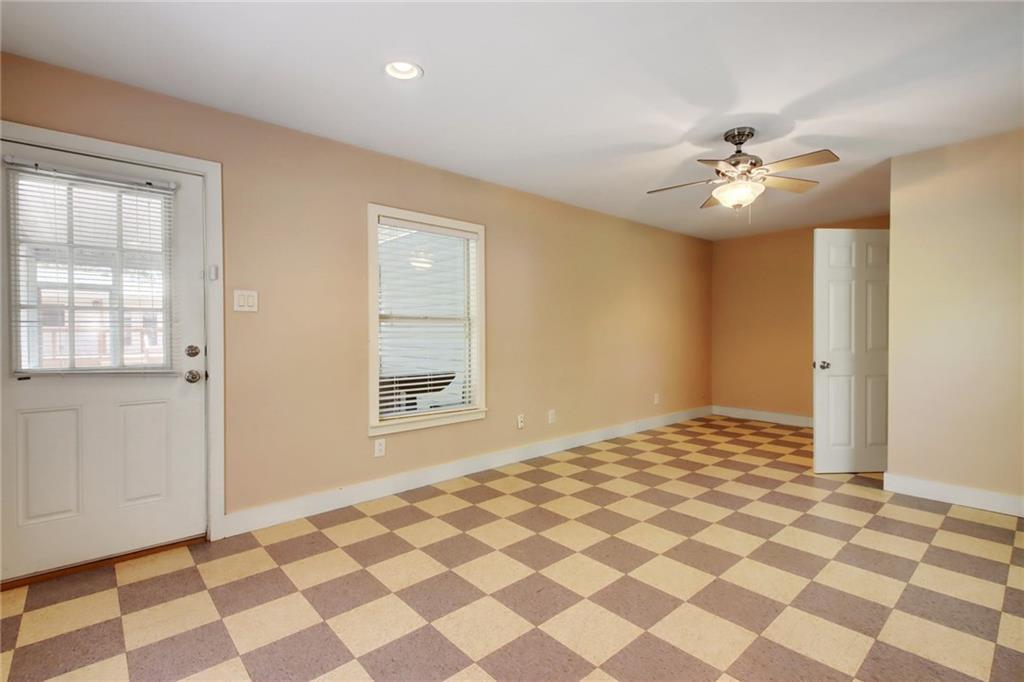 1408 Ruth Avenue Austin, TX 78757 - Photo 25 of 33 a view of a room with a black white checkered floor