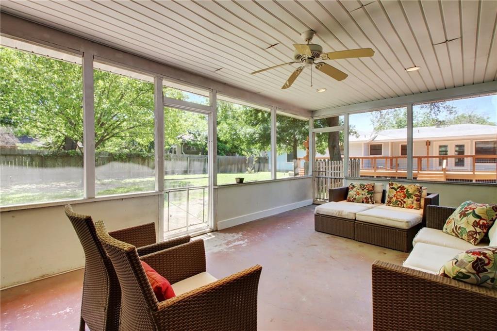 1408 Ruth Avenue Austin, TX 78757 - Photo 27 of 33 a living room with furniture and a large window