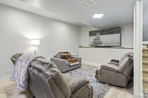 a bedroom with a bed and a cabinets