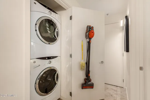 a view of a storage & utility room with a washer and dryer