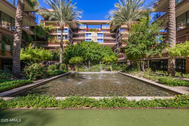 a view of a lake with a building in the background