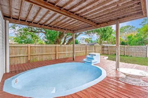 5334 Dartmouth Road New Port Richey, FL 34652 - Photo 13 of 13 a view of outdoor space with swimming pool